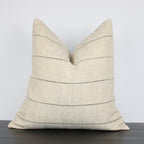 This fabric is absolutely wonderful! It has a thin, woven black stripe on a slubby, sand-colored background, giving it an organic quality that suits a variety of spaces, from modern to traditional.
